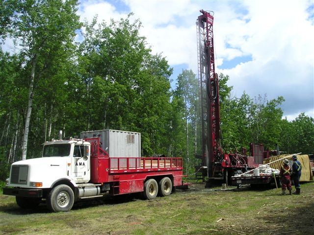 Drill and trailer in summer