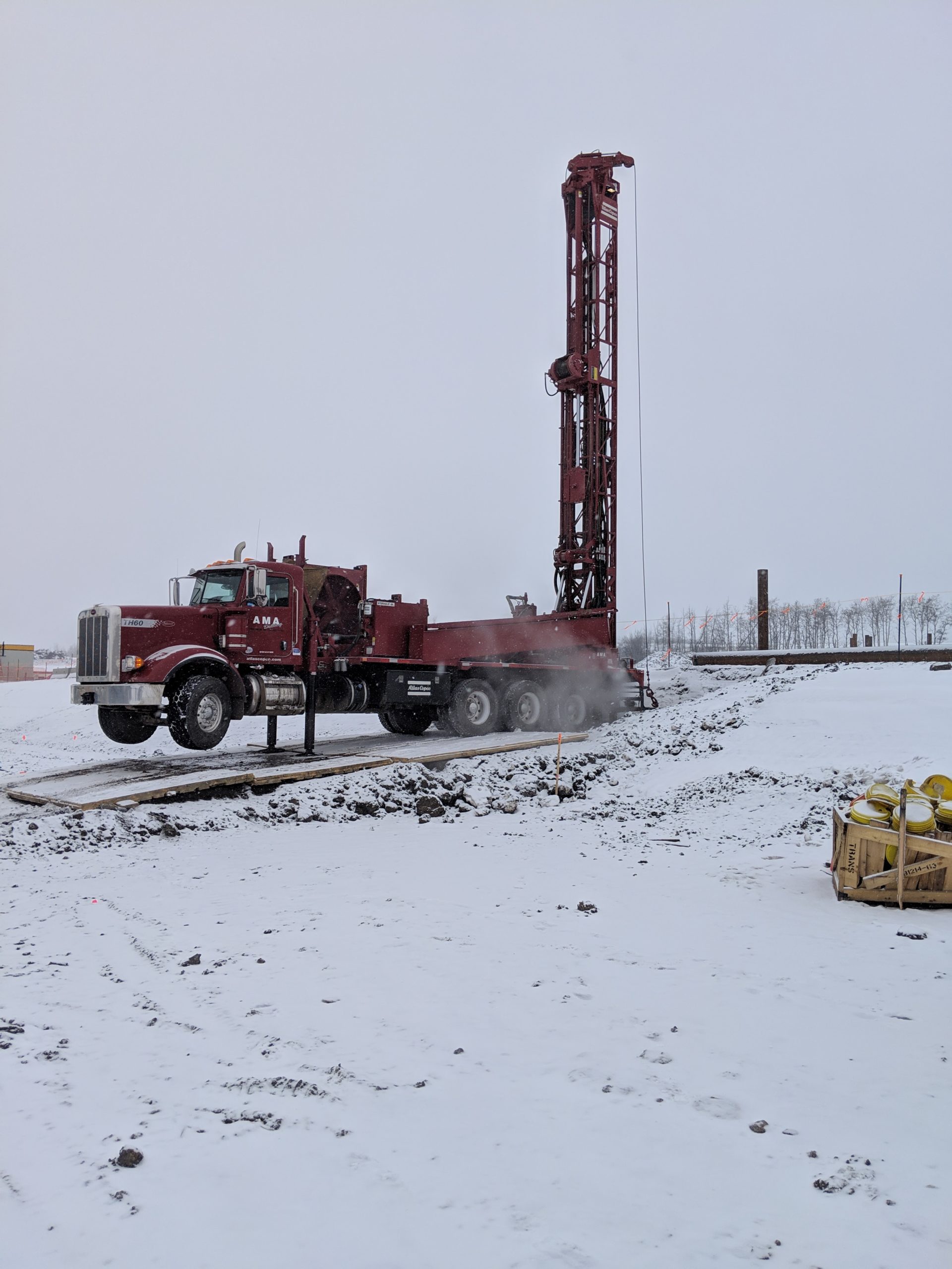 Drilling on outriggers in snow