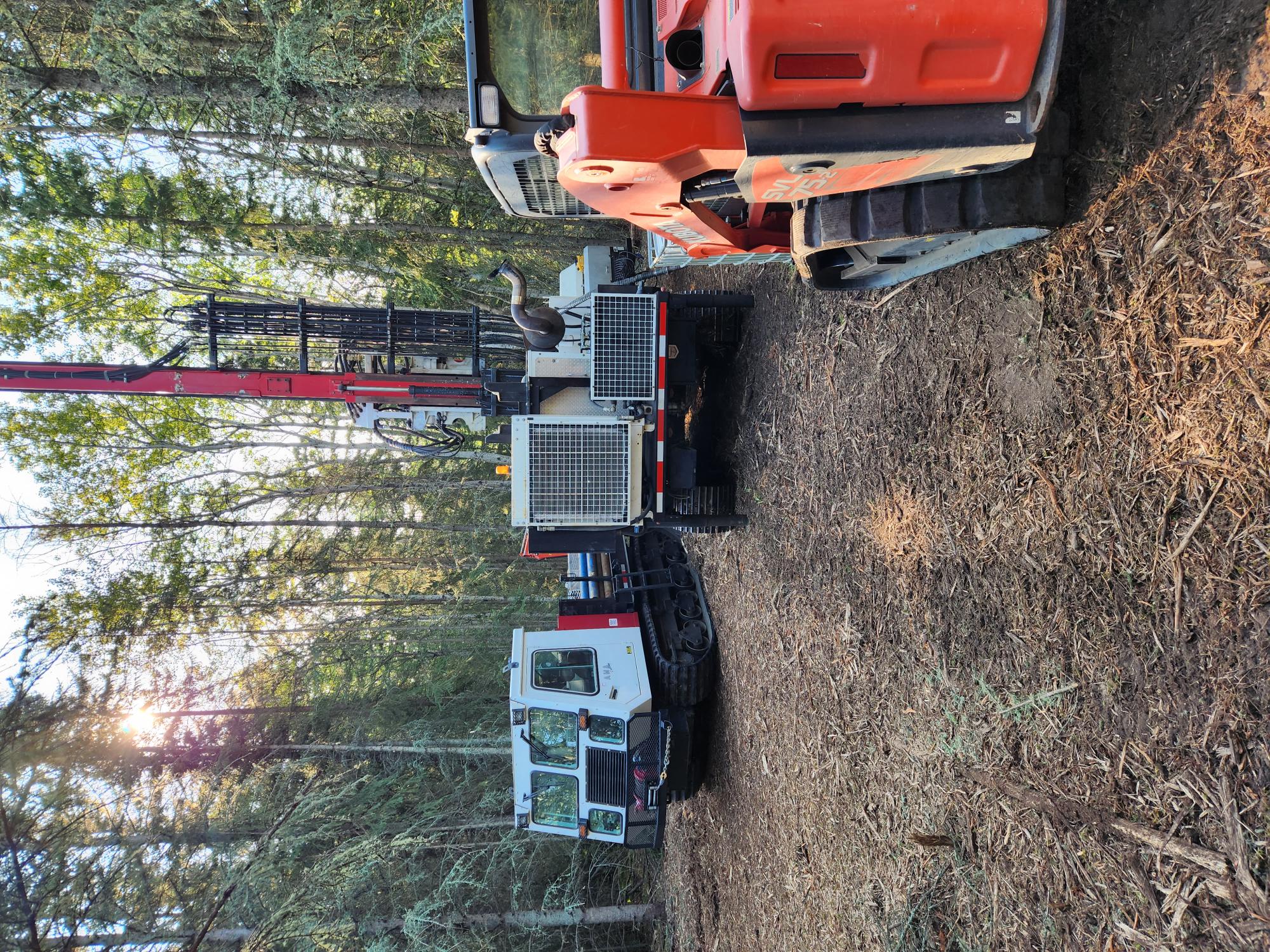 Drilling trucks and excavator